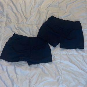 two pairs of black spandex